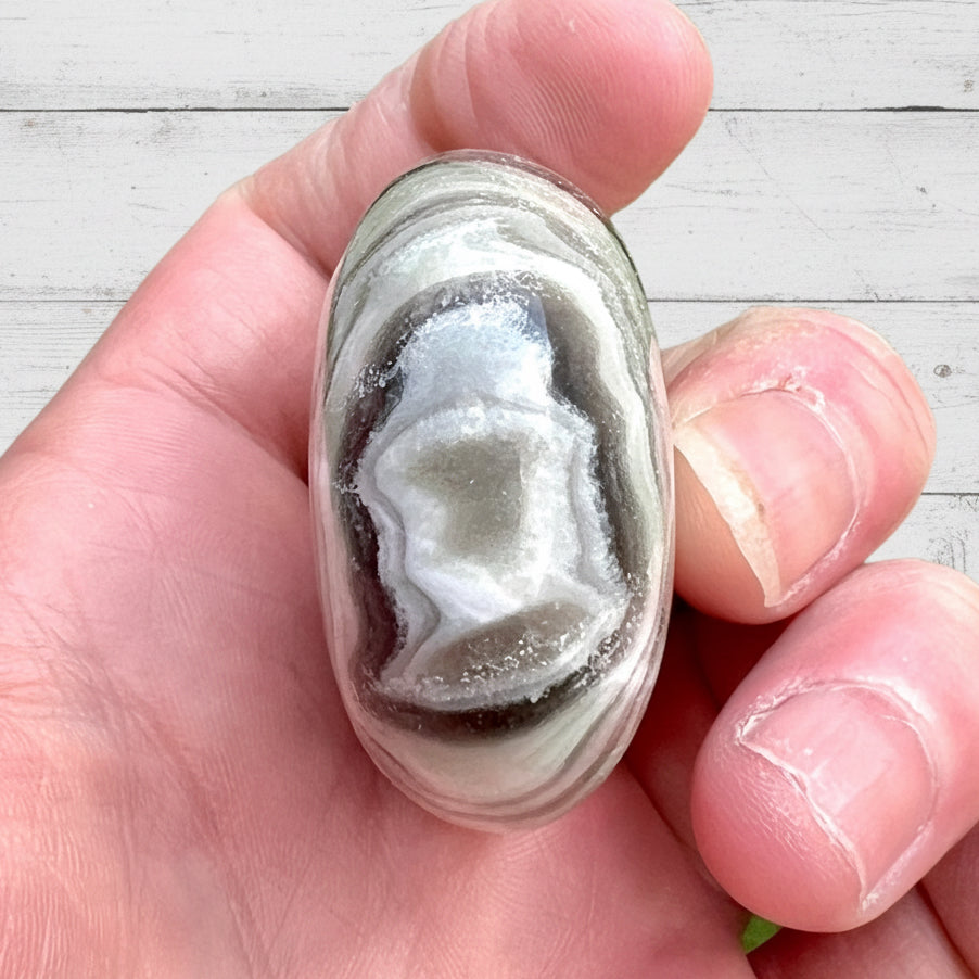 Zebra Calcite Palmstone 87 grams ZCP01