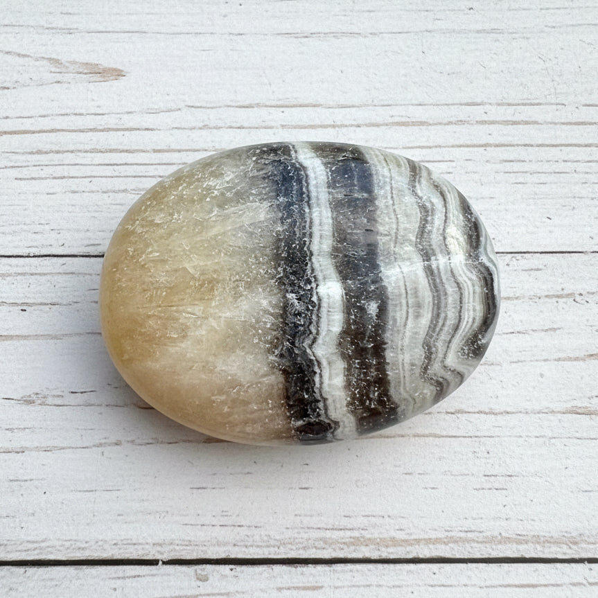 Zebra Calcite Palmstone 87 grams ZCP01