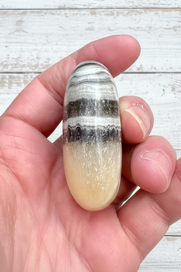 Zebra Calcite Palmstone 87 grams ZCP01